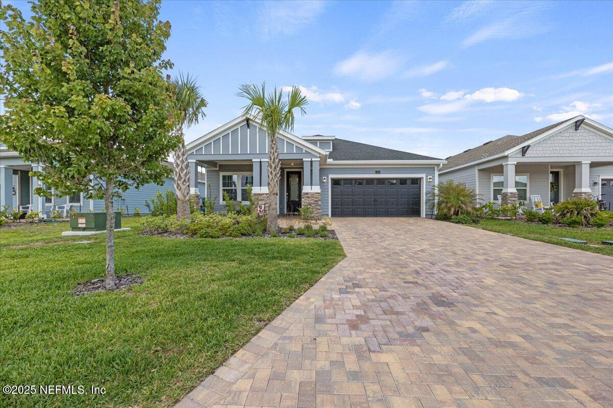 50 Dollar Court St. Augustine, FL 32092 - Photo 1 of 55 a front view of house with yard and green space