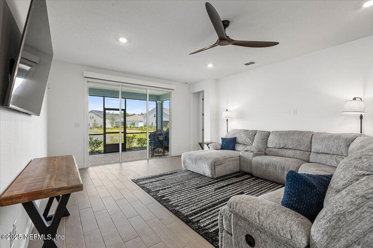50 Dollar Court St. Augustine, FL 32092 - Photo 18 of 55 a living room with furniture and a window