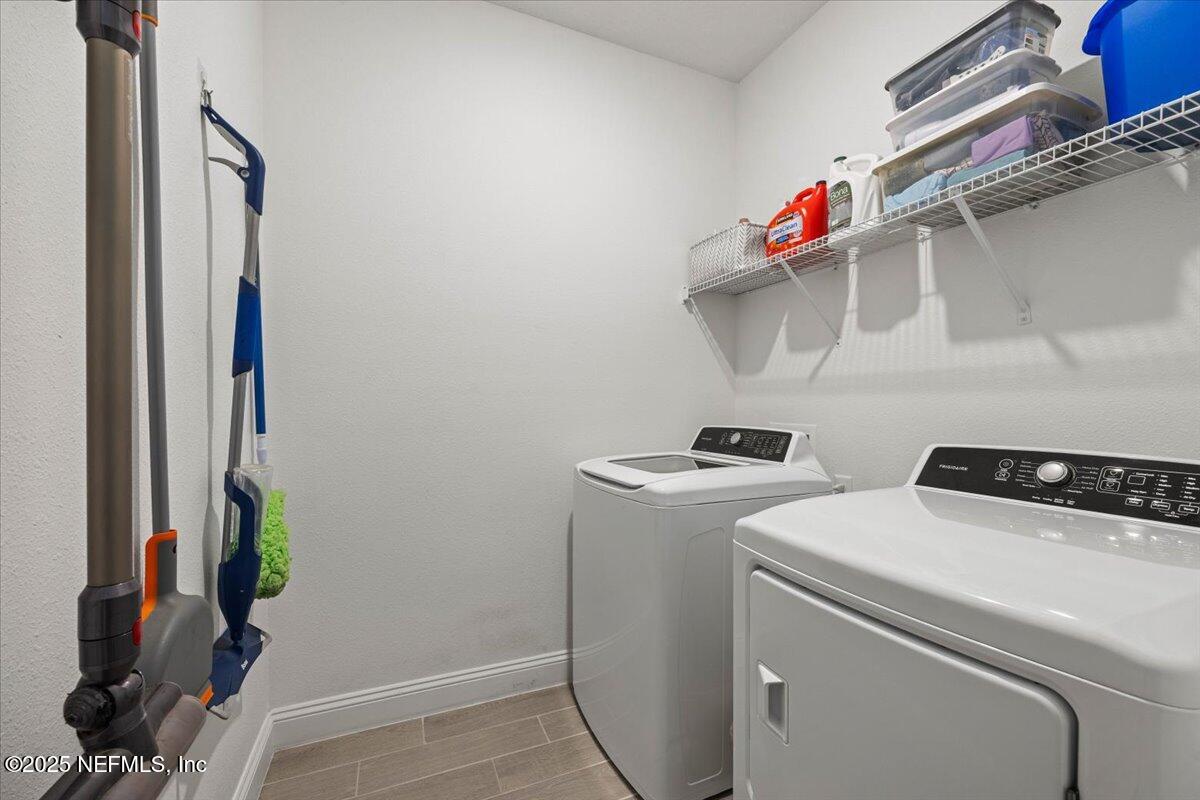 50 Dollar Court St. Augustine, FL 32092 - Photo 34 of 55 a utility room with dryer and washer