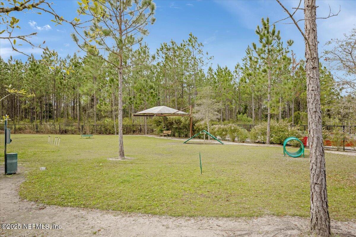 50 Dollar Court St. Augustine, FL 32092 - Photo 50 of 55 a view of a swimming pool and an outdoor space