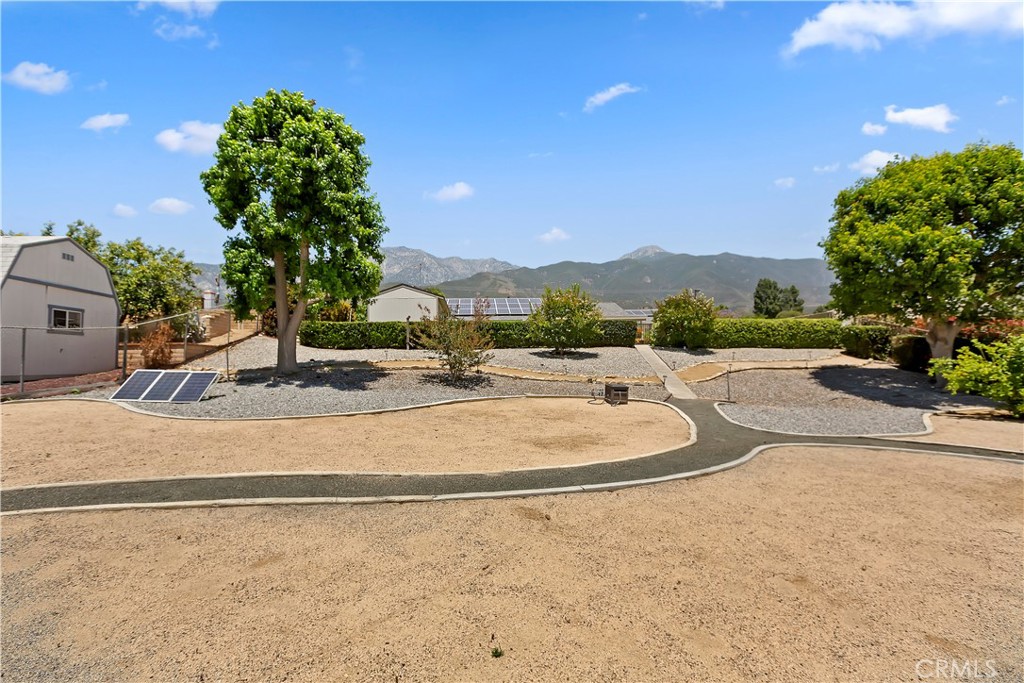 8527 Hillside Road Rancho Cucamonga, CA 91701 - Photo 36 of 50 a view of a basket ball ground and a lake view