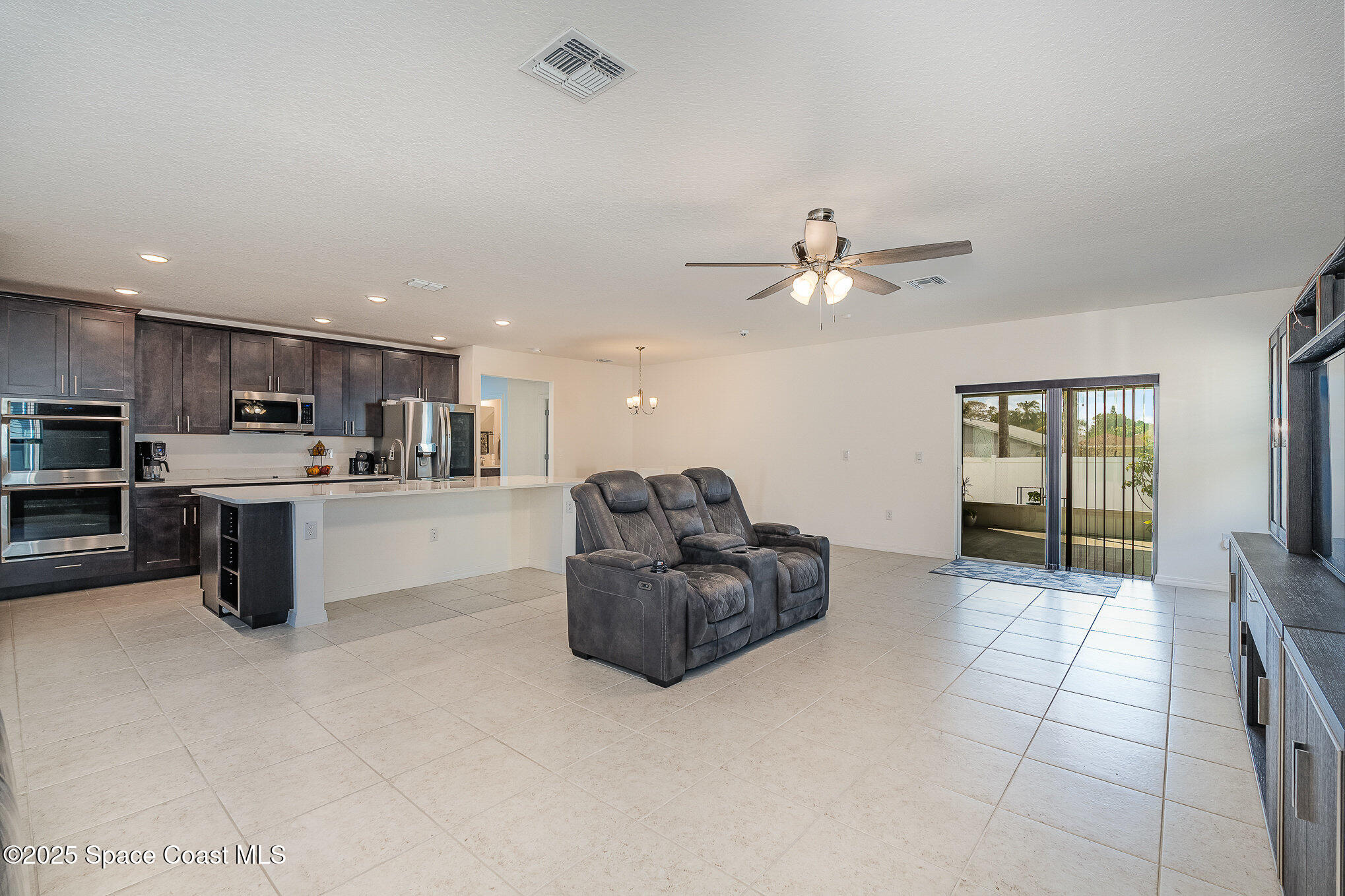 965 Edensor Lane Rockledge, FL 32955 - Photo 6 of 42 living room/ kitchen