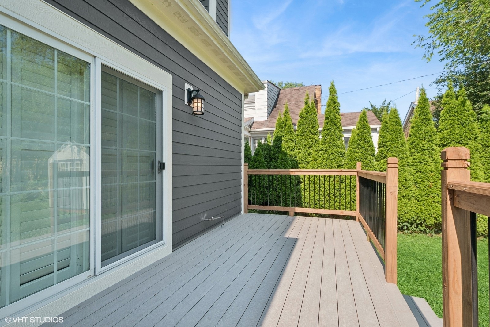 1635 Elder Lane Northfield, IL 60093 - Photo 24 of 30 a view of a balcony with wooden floor and fence