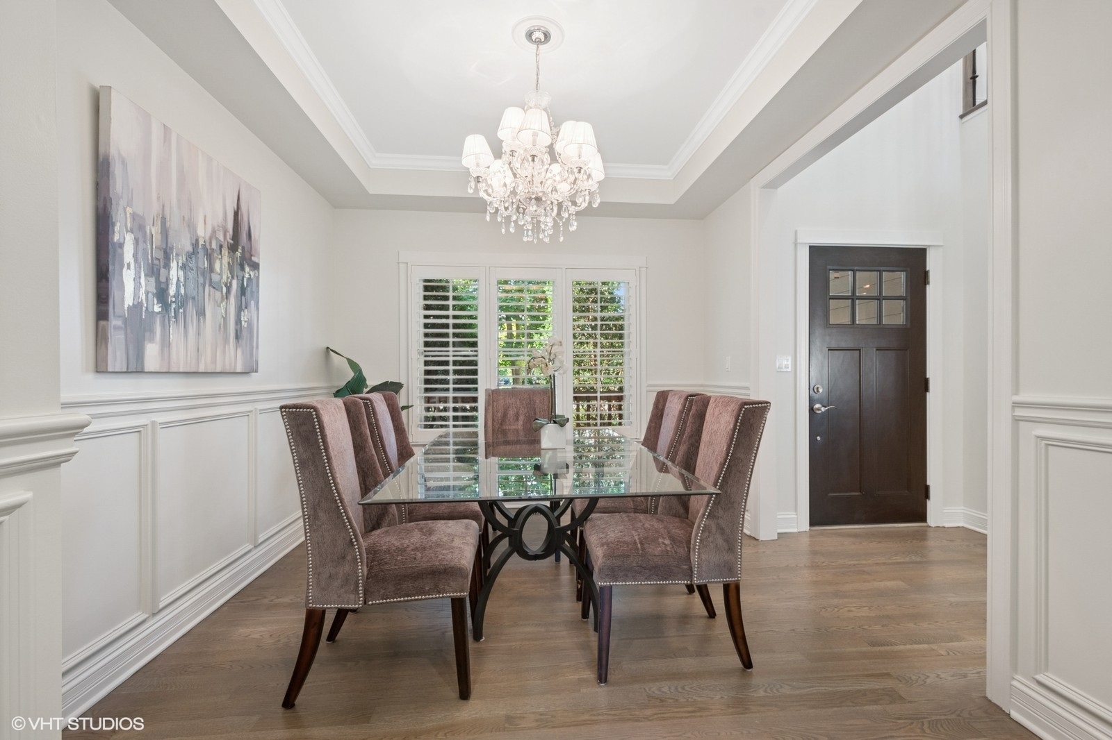 1635 Elder Lane Northfield, IL 60093 - Photo 6 of 30 a view of a dining room with furniture a chandelier and wooden floor