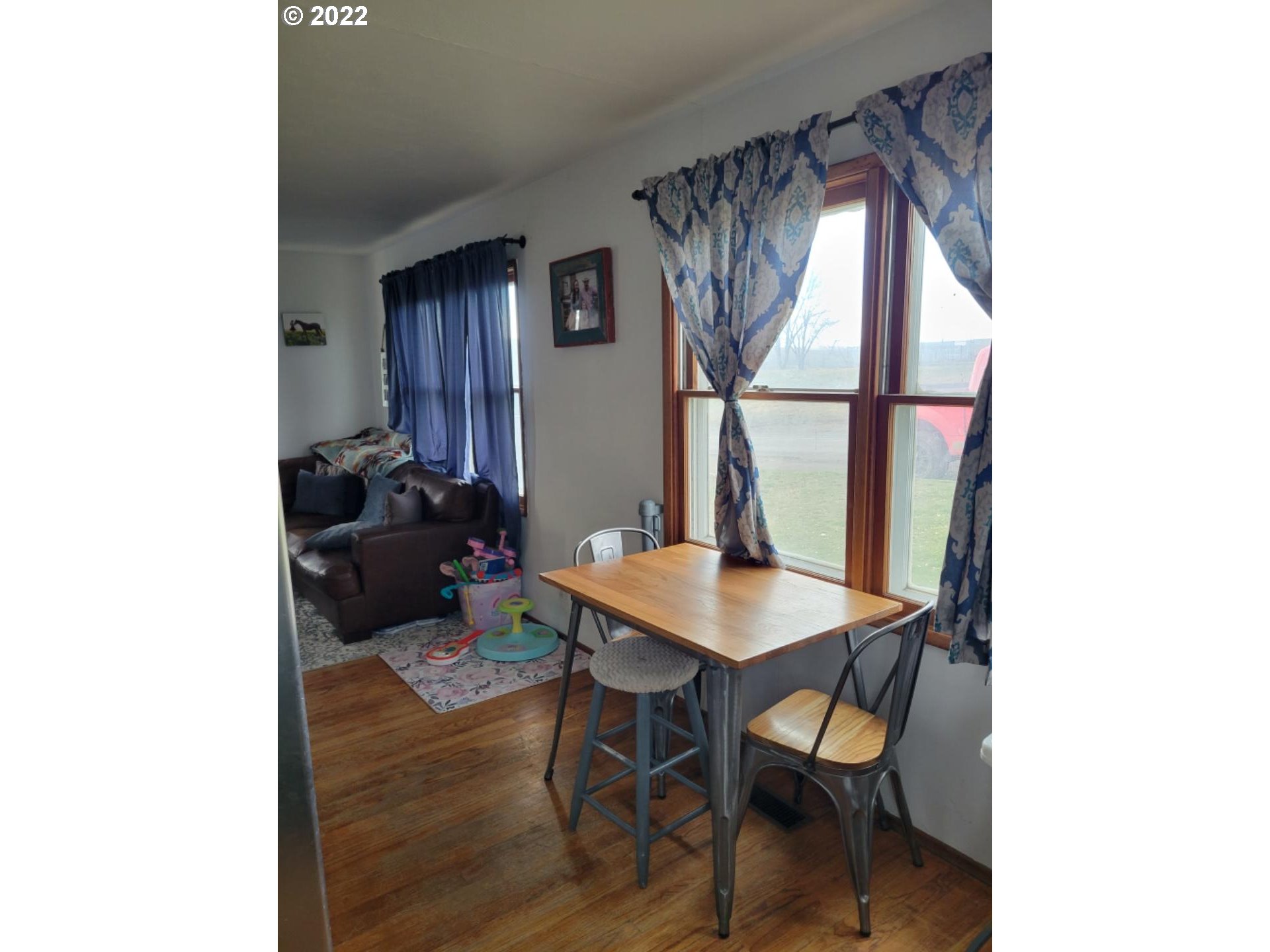 3124 Southwest Hailey Avenue Pendleton, OR 97801 - Photo 4 of 15 a view of a dining room with furniture and a window