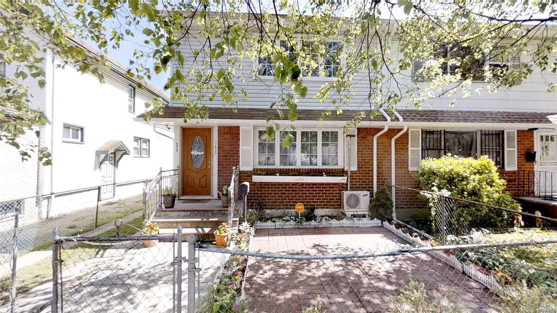 176-32 133rd Road Queens, NY 11434 - Photo 1 of 1 a front view of a house with a yard