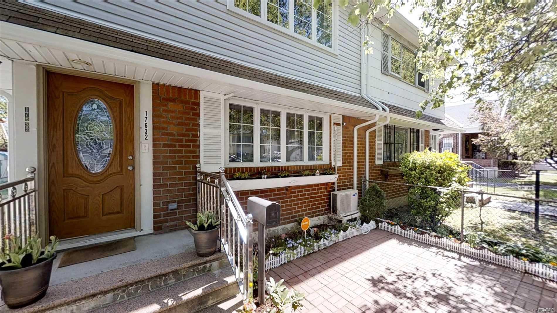 176-32 133rd Road Queens, NY 11434 - Photo 2 of 11 a front view of a house with outdoor seating
