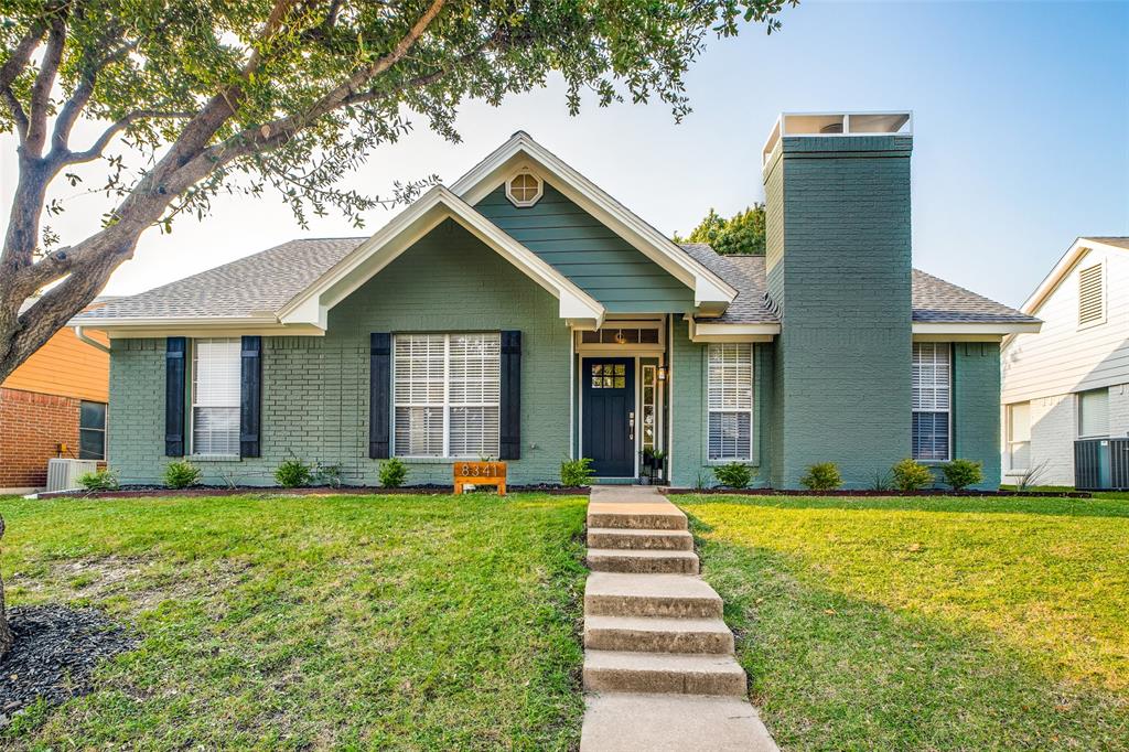 8341 Edgewater Drive Frisco, TX 75034 - Photo 1 of 22 a front view of a house with yard and green space