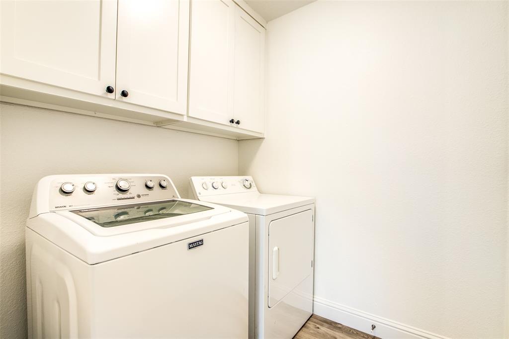 8341 Edgewater Drive Frisco, TX 75034 - Photo 15 of 22 a utility room with dryer and washer