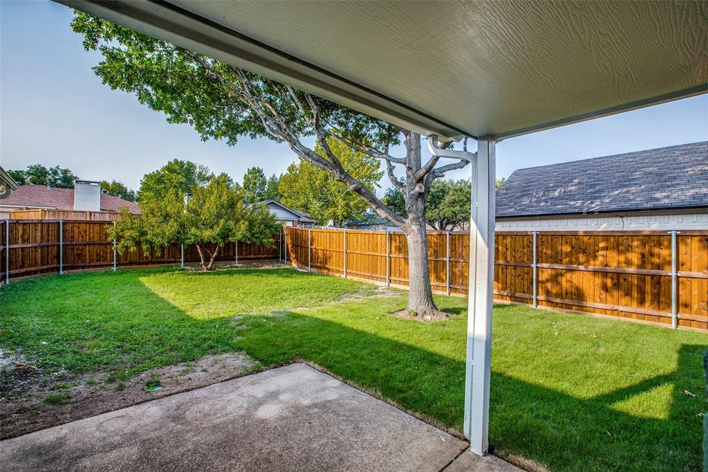 8341 Edgewater Drive Frisco, TX 75034 - Photo 19 of 22 a view of a house with a backyard