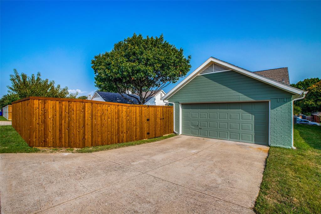 8341 Edgewater Drive Frisco, TX 75034 - Photo 21 of 22 a front view of a house with a garage