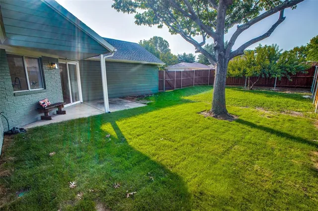 a view of a backyard with a garden