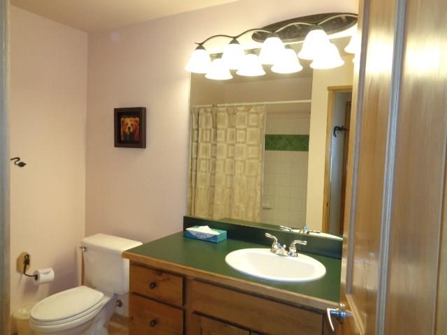 129 River Run Road, Unit 8036 Keystone, CO 80435 - Photo 9 of 20 a bathroom with a sink and a mirror