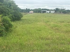 891 County Road Groesbeck, TX 76642 - Photo 5 of 6 a view of a large body of water with a building in the background