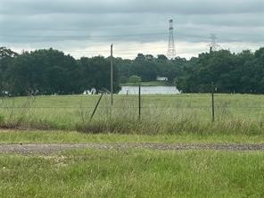 891 County Road Groesbeck, TX 76642 - Photo 6 of 6 a view of a backyard