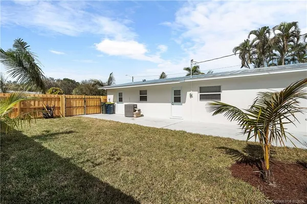 a view of backyard with green space