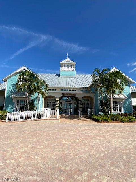 14715 Kelson Circle Naples, FL 34114 - Photo 24 of 35 a view of a building with a street