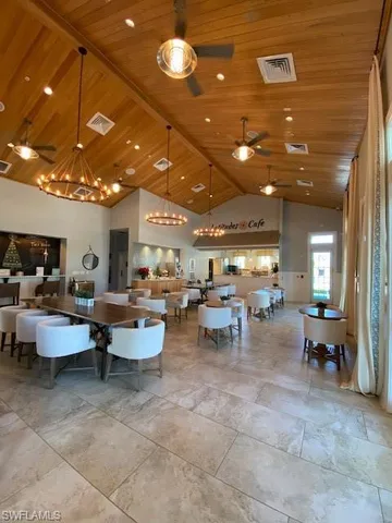 a group of people sitting in living room