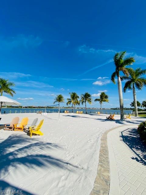 14715 Kelson Circle Naples, FL 34114 - Photo 31 of 35 a view of a swimming pool and lounge chair