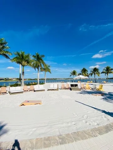 a view of a swimming pool and a yard