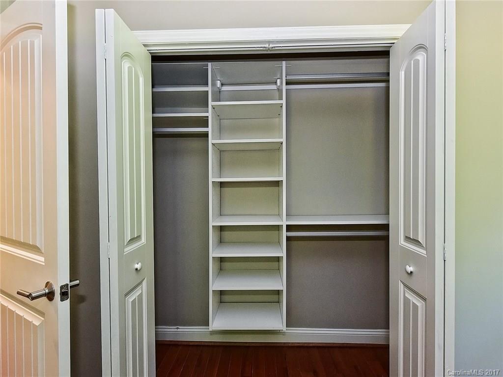 4116 Randolph Road Charlotte, NC 28211 - Photo 14 of 24 a view of walk in closet with empty racks