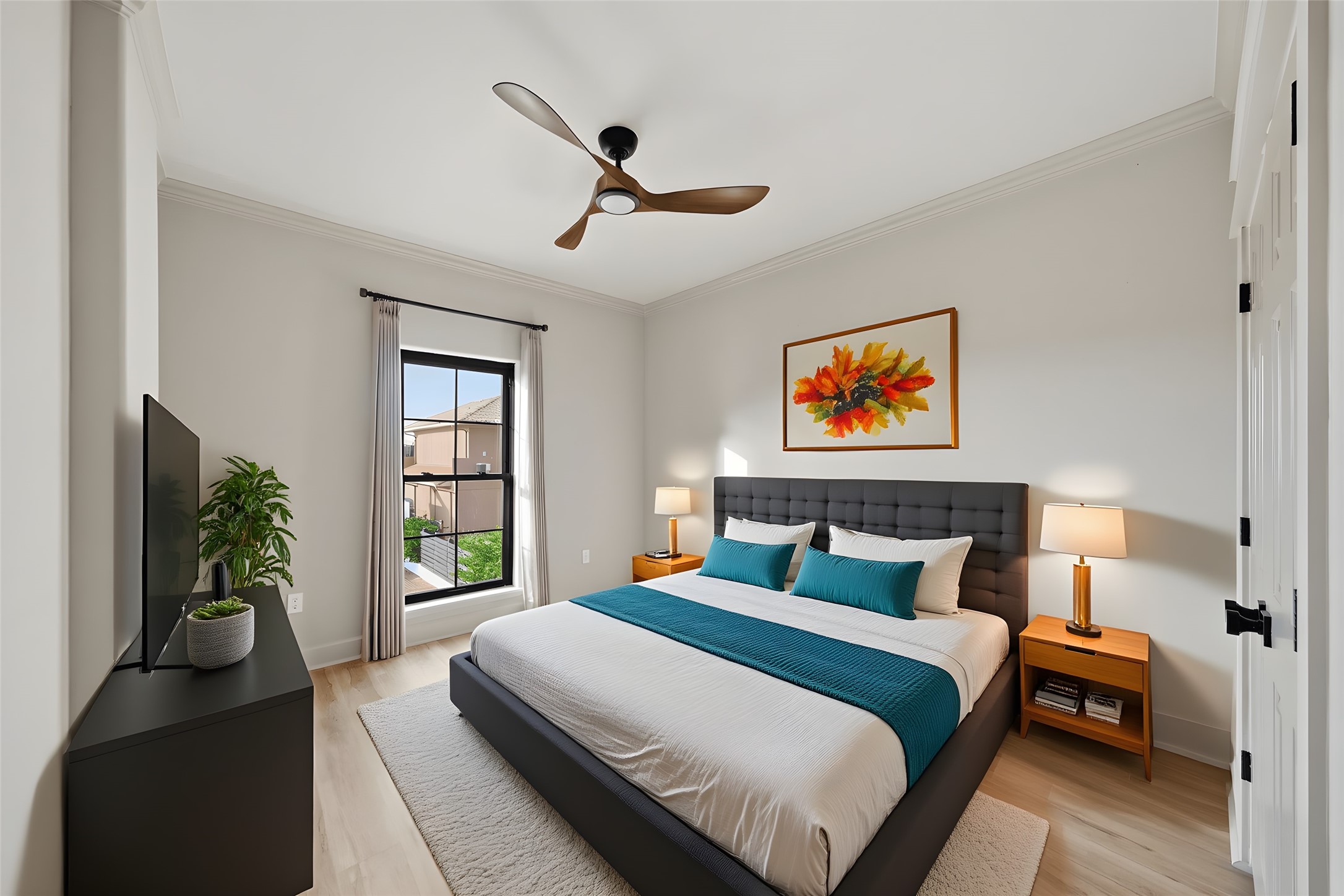 1918 Todville Road Seabrook, TX 77586 - Photo 18 of 41 One of two second-level guest bedrooms, this light-filled space overlooks the motor court and front courtyard, offering a quiet retreat away from the main living areas.