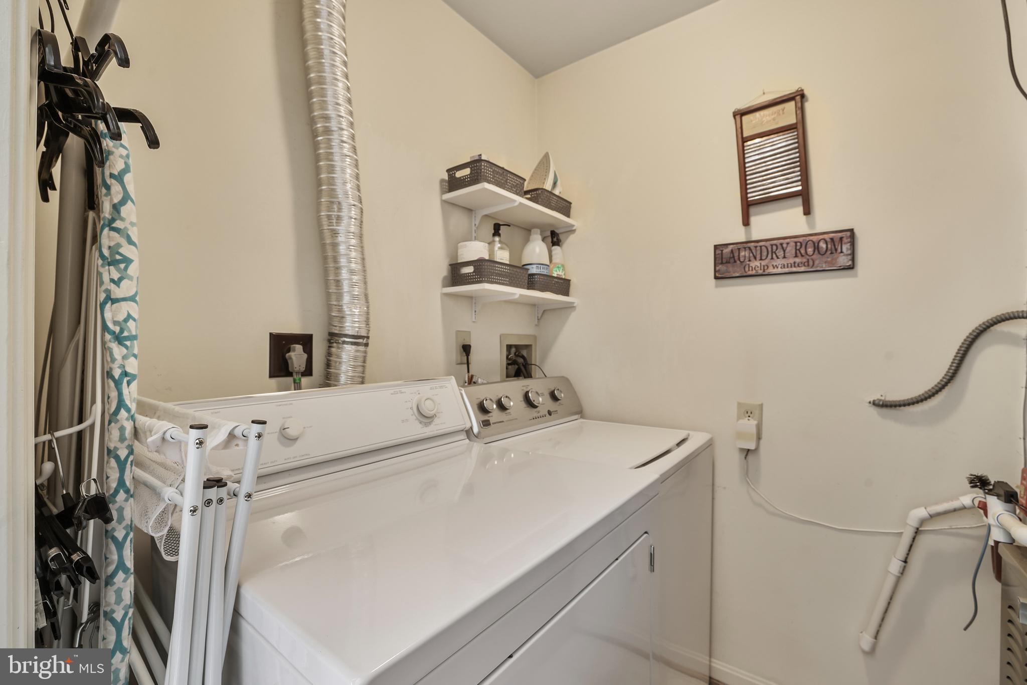 2128 Elm Tree Lane Silver Spring, MD 20906 - Photo 12 of 55 a utility room with dryer and washer
