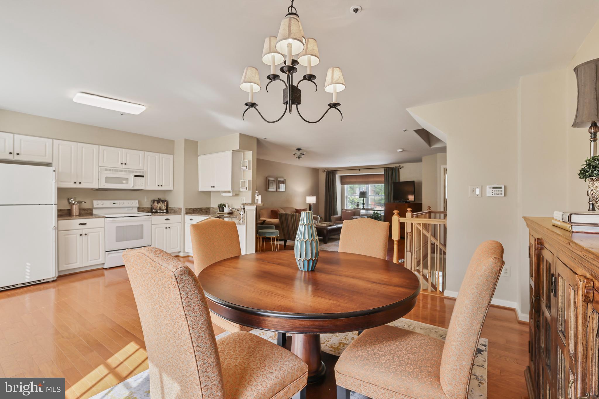 2128 Elm Tree Lane Silver Spring, MD 20906 - Photo 14 of 55 a view of a dining room with furniture and wooden floor