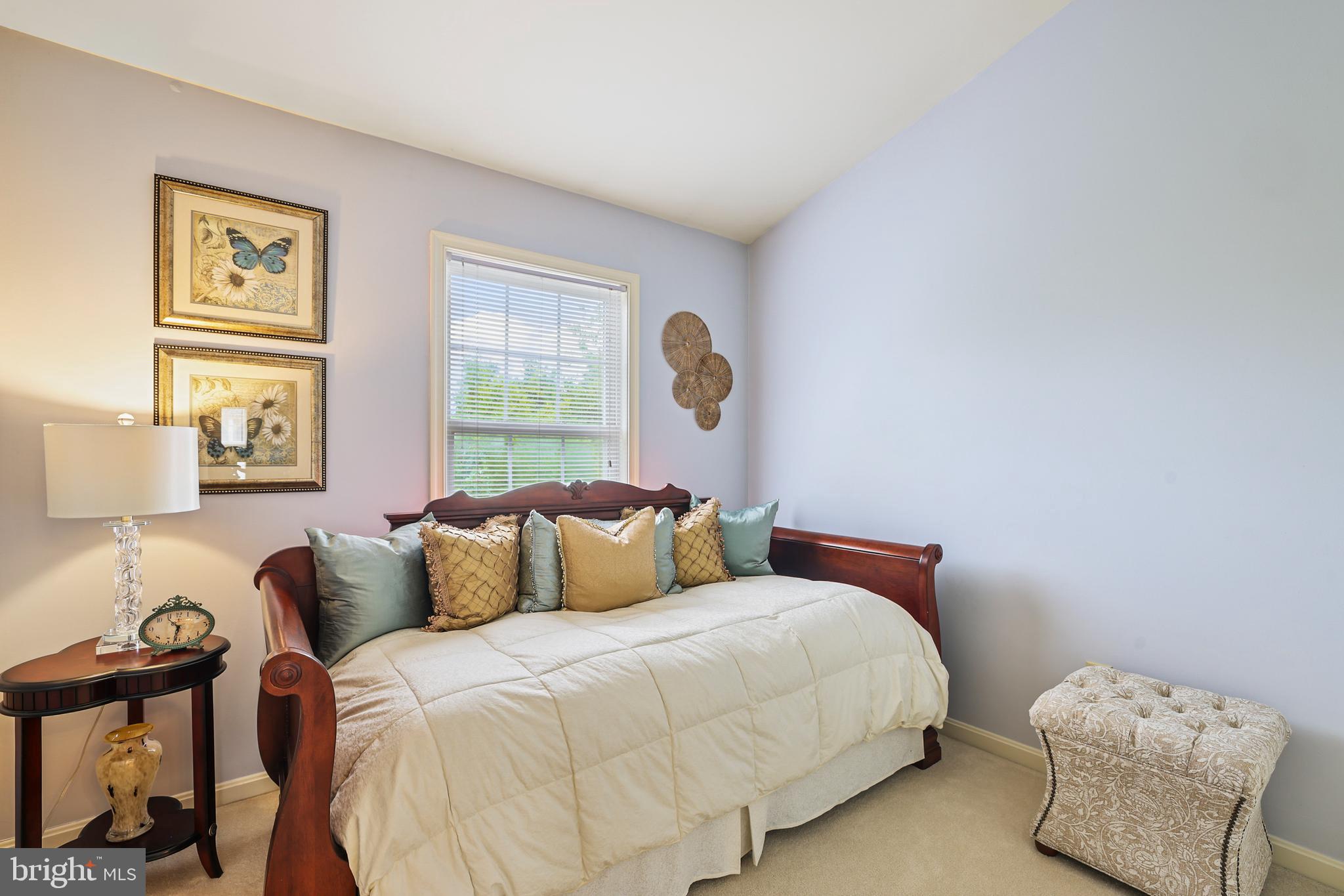2128 Elm Tree Lane Silver Spring, MD 20906 - Photo 32 of 55 a bedroom with a bed and a window
