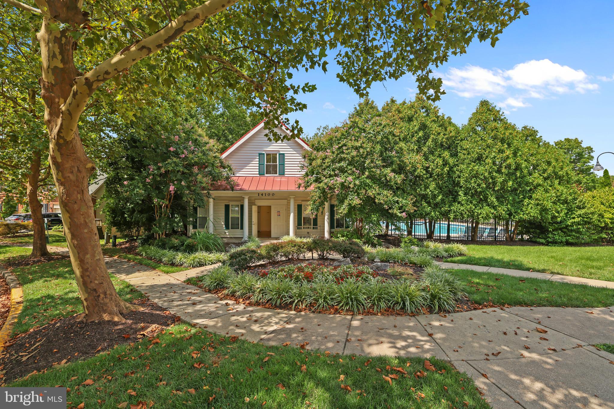 2128 Elm Tree Lane Silver Spring, MD 20906 - Photo 43 of 55 a front view of a house with a yard