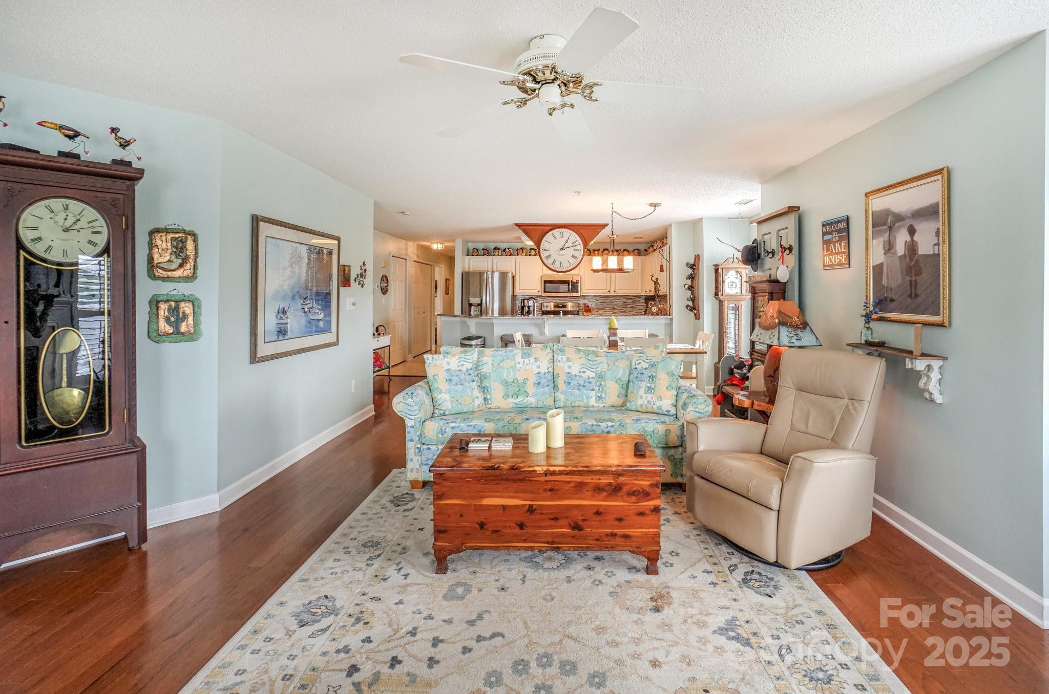 1238 Torrence Circle Davidson, NC 28036 - Photo 17 of 43 a bedroom with furniture and wooden floor