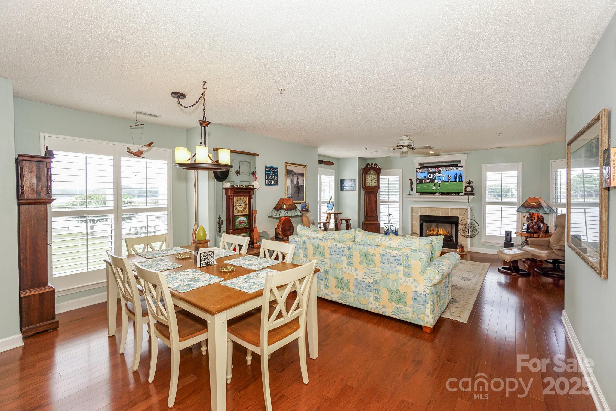 1238 Torrence Circle Davidson, NC 28036 - Photo 19 of 43 a view of a dining room with furniture window and wooden floor