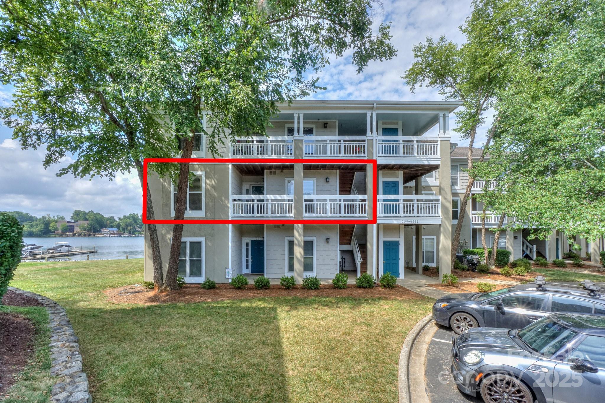 1238 Torrence Circle Davidson, NC 28036 - Photo 3 of 43 a view of a house with swimming pool and porch