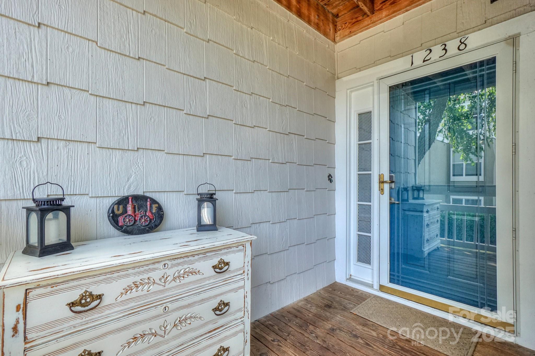 1238 Torrence Circle Davidson, NC 28036 - Photo 36 of 43 a kitchen with a stove and a shower curtain