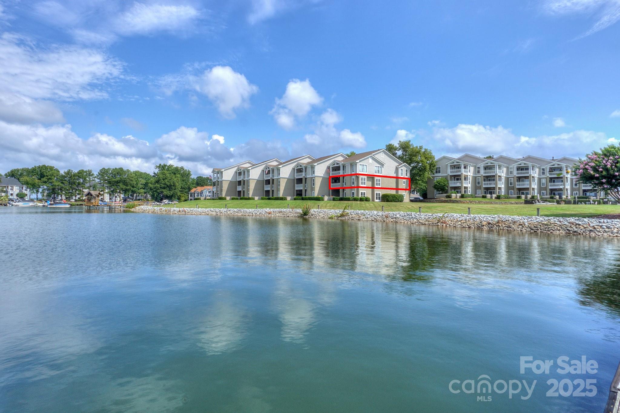 1238 Torrence Circle Davidson, NC 28036 - Photo 43 of 43 a view of residential house with outdoor space and lake