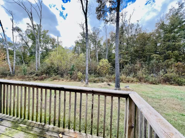 a view of a balcony with outdoor space