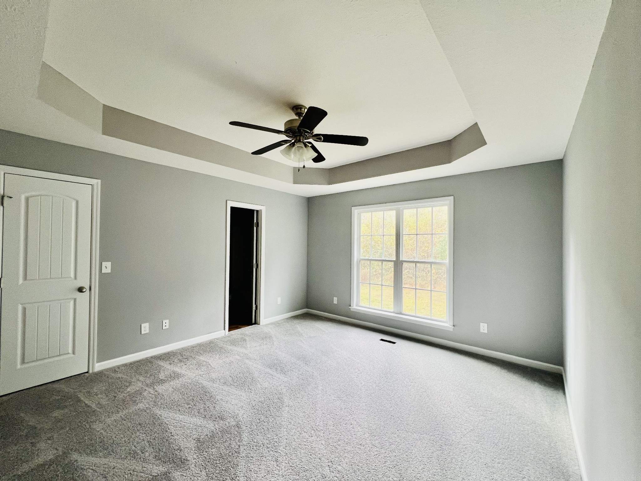 79 Benson School Road Kelso, TN 37348 - Photo 8 of 24 a view of a livingroom with a ceiling fan and window