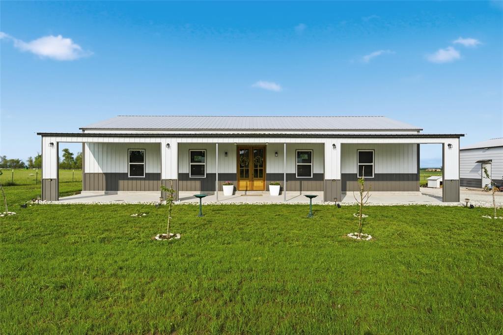 151 Kasberg Road Leroy, TX 76691 - Photo 2 of 40 a view of a house with backyard porch and sitting area