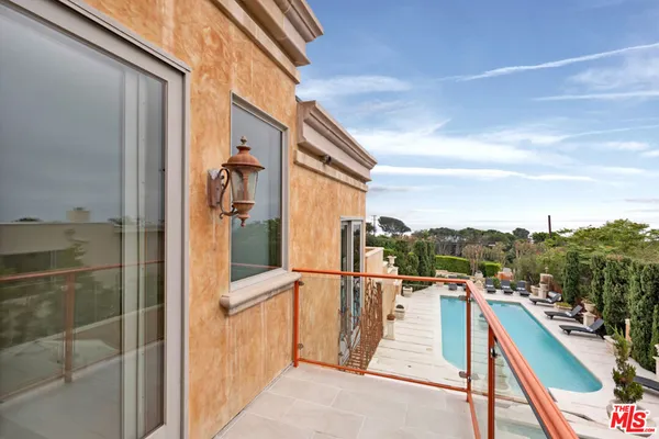 a bathroom with a granite countertop sink mirror and shower