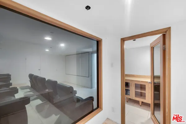 a bathroom with a sink and a large mirror