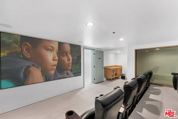 a bathroom with a bath tub and a window