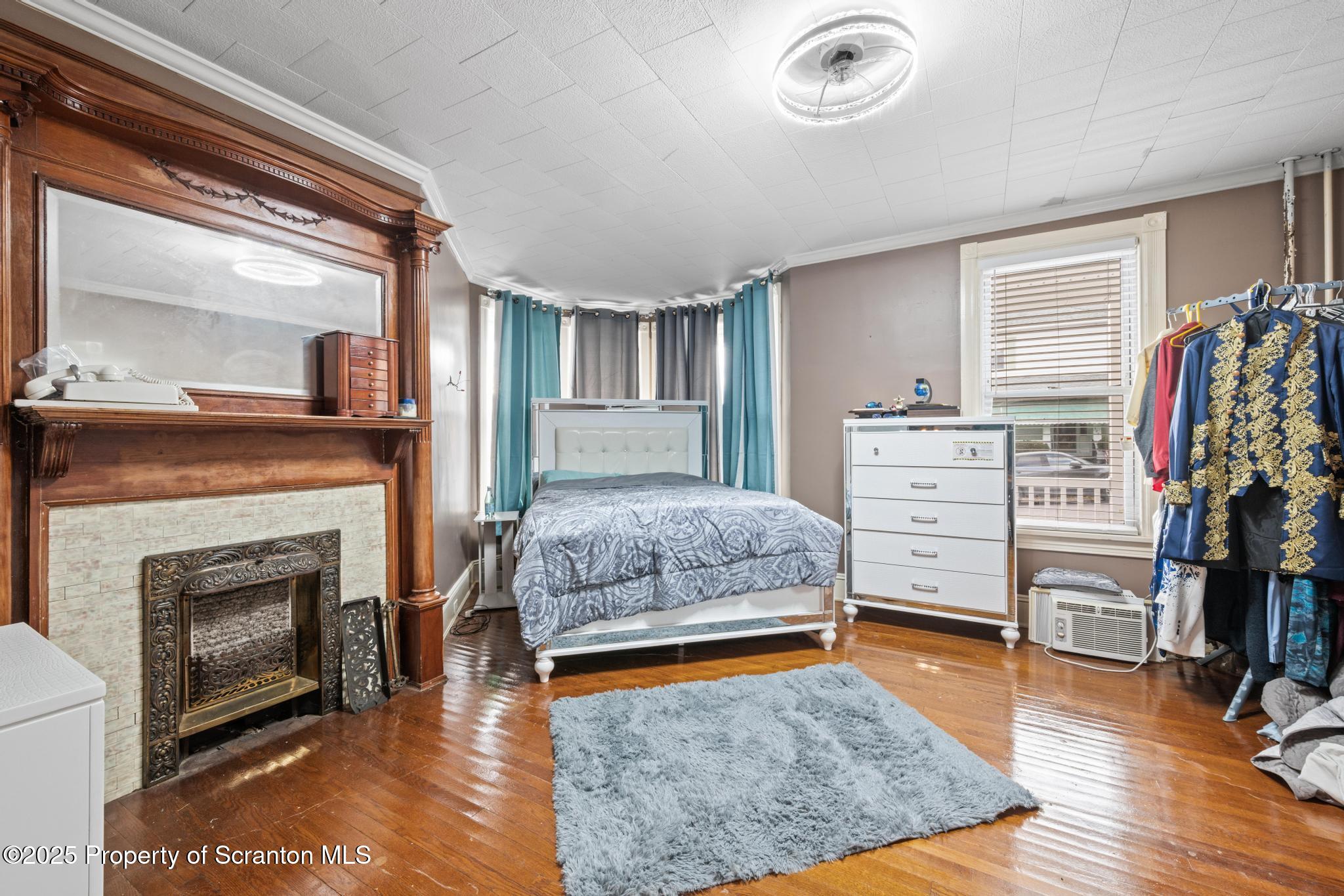 523 North Laurel Street Hazleton, PA 18201 - Photo 11 of 19 a living room with furniture and a fireplace