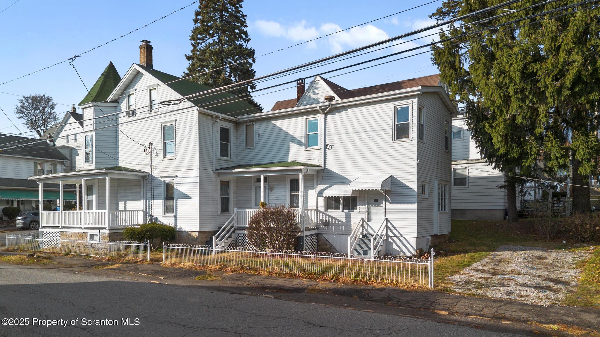 523 North Laurel Street Hazleton, PA 18201 - Photo 6 of 19 a front view of a house with a yard