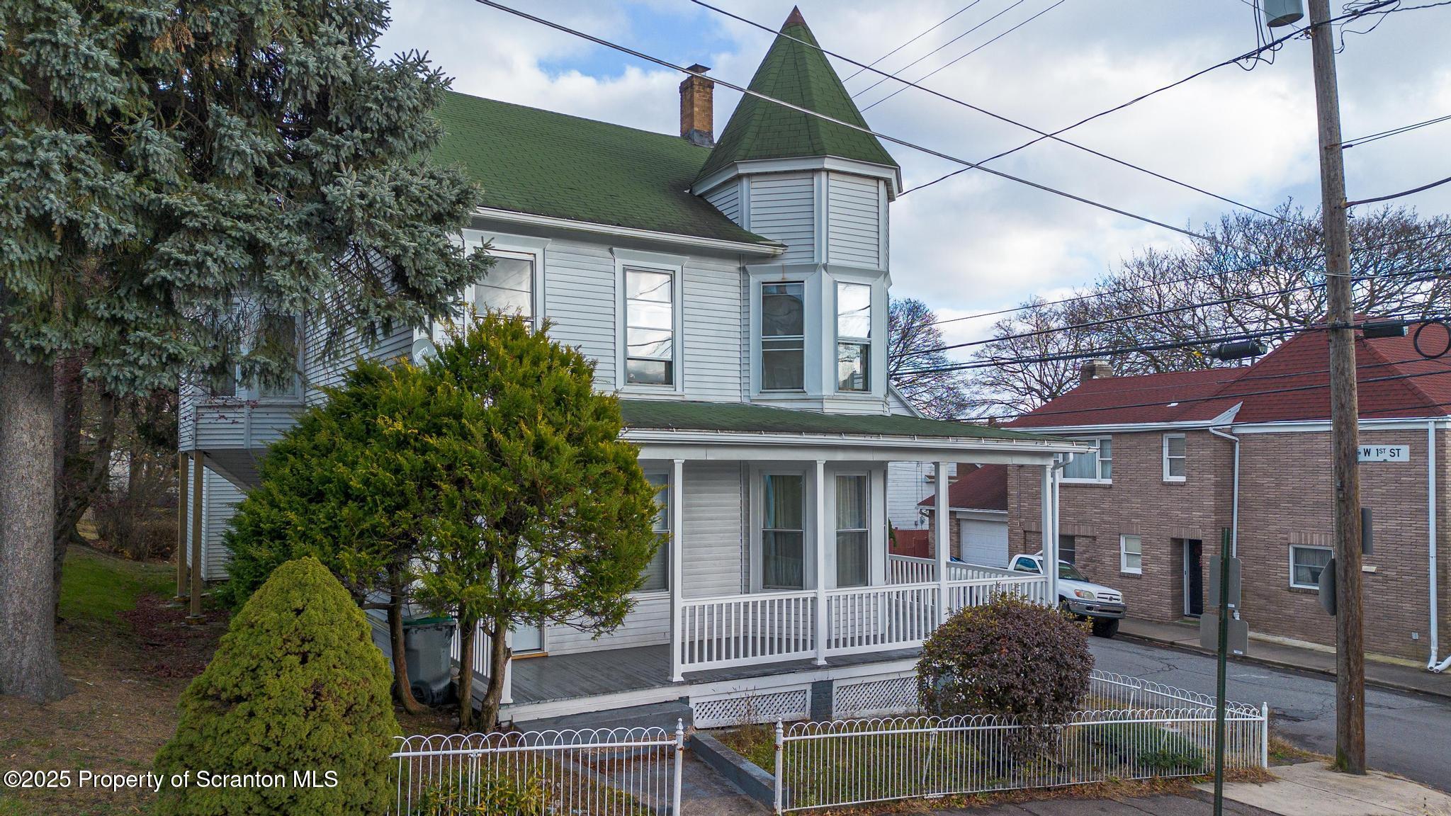 523 North Laurel Street Hazleton, PA 18201 - Photo 8 of 19 a front view of a house with garden