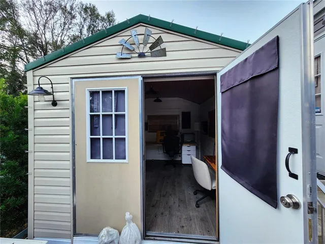 a front view of a house with a porch