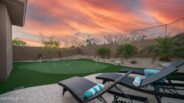 a view of a patio with garden