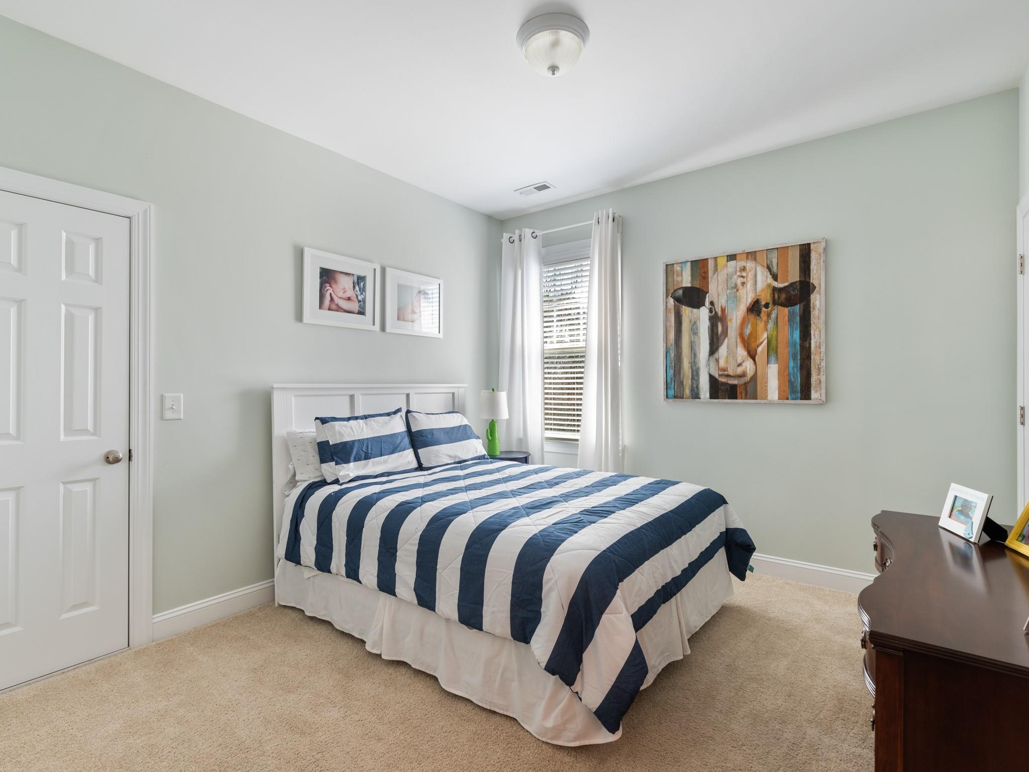 4300 Birkshire Heights Fort Mill, SC 29708 - Photo 26 of 40 a bedroom with bed and a window