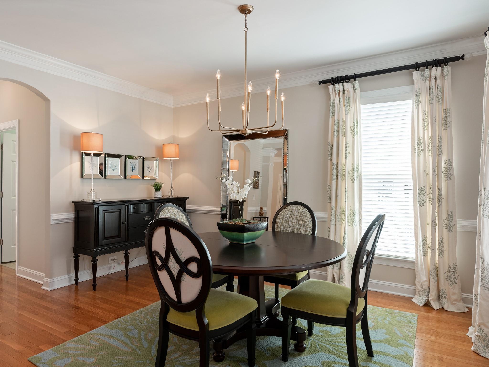 4300 Birkshire Heights Fort Mill, SC 29708 - Photo 4 of 40 a view of a dining room with furniture window and wooden floor