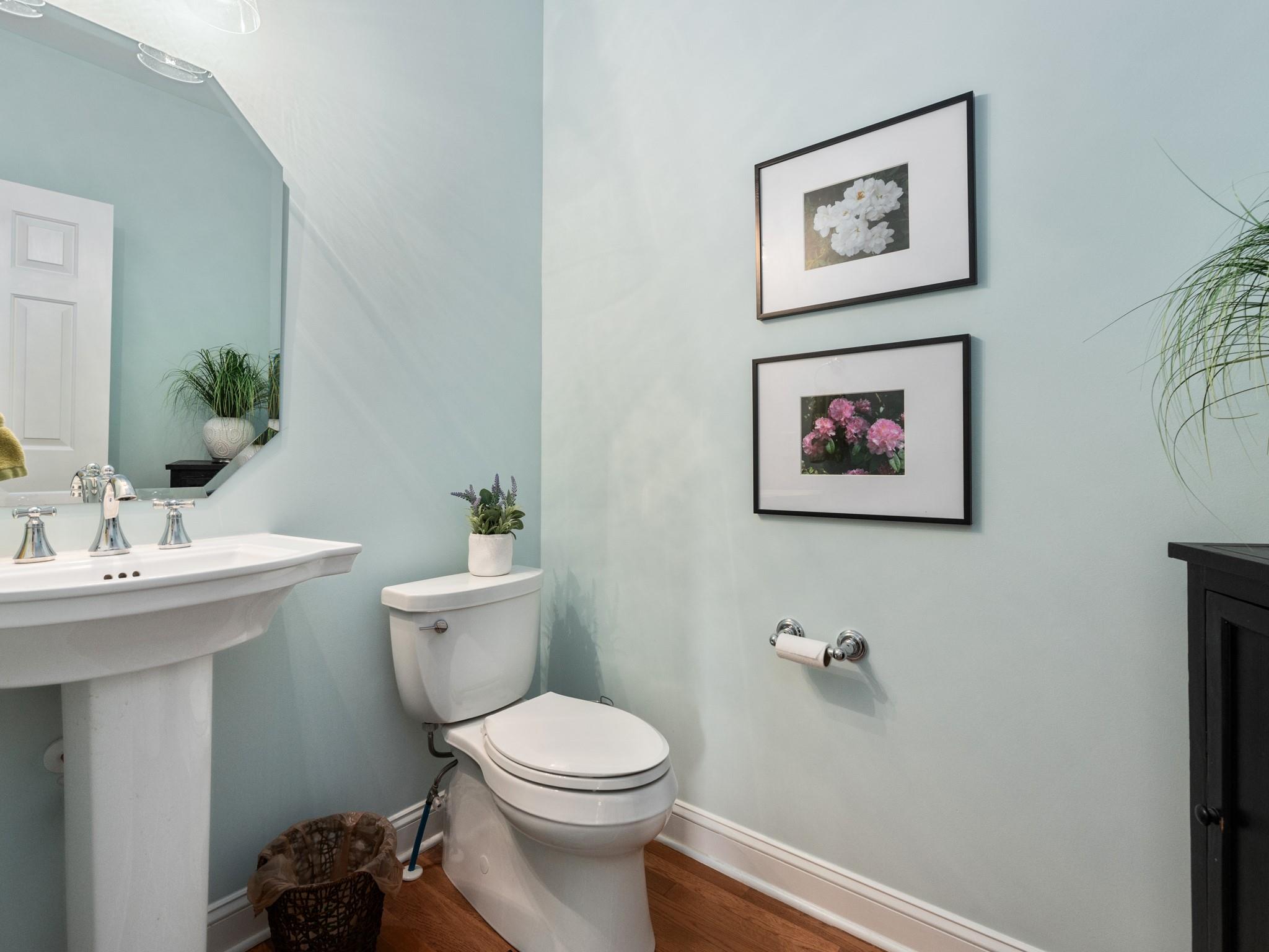 4300 Birkshire Heights Fort Mill, SC 29708 - Photo 6 of 40 a bathroom with a toilet a sink and mirror