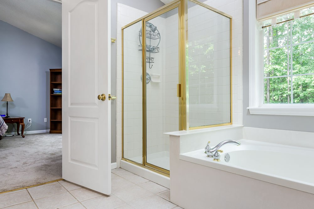 9501 Miranda Drive Raleigh, NC 27617 - Photo 18 of 30 Relax in the garden tub with a clear view of the stars! Master Bath